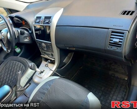 Чорний Тойота Королла, об'ємом двигуна 1.6 л та пробігом 207 тис. км за 6800 $, фото 3 на Automoto.ua