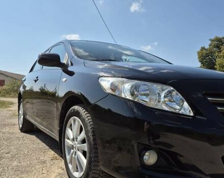 Чорний Тойота Королла, об'ємом двигуна 1.6 л та пробігом 148 тис. км за 7200 $, фото 4 на Automoto.ua