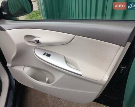 Чорний Тойота Королла, об'ємом двигуна 1.6 л та пробігом 132 тис. км за 7985 $, фото 23 на Automoto.ua