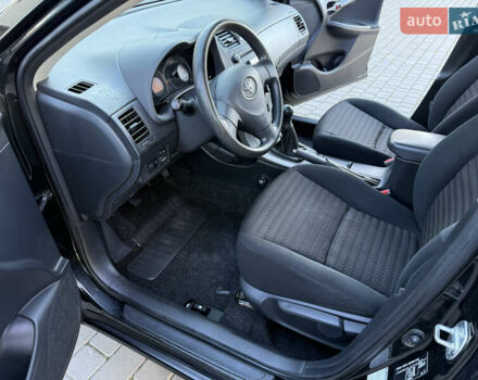 Черный Тойота Королла, объемом двигателя 1.6 л и пробегом 147 тыс. км за 6999 $, фото 42 на Automoto.ua