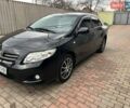 Черный Тойота Королла, объемом двигателя 1.6 л и пробегом 185 тыс. км за 6500 $, фото 1 на Automoto.ua