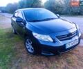 Чорний Тойота Королла, об'ємом двигуна 1.6 л та пробігом 230 тис. км за 6800 $, фото 1 на Automoto.ua