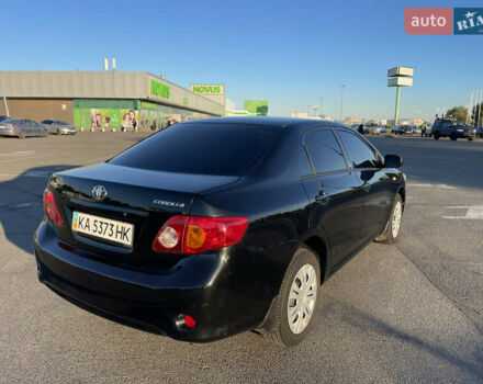 Чорний Тойота Королла, об'ємом двигуна 1.6 л та пробігом 174 тис. км за 7400 $, фото 2 на Automoto.ua