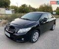 Чорний Тойота Королла, об'ємом двигуна 1.6 л та пробігом 161 тис. км за 6700 $, фото 1 на Automoto.ua