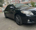 Чорний Тойота Королла, об'ємом двигуна 1.6 л та пробігом 147 тис. км за 7700 $, фото 1 на Automoto.ua