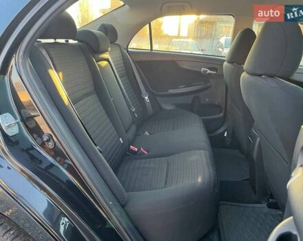 Черный Тойота Королла, объемом двигателя 1.6 л и пробегом 186 тыс. км за 7490 $, фото 9 на Automoto.ua