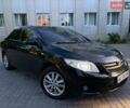 Чорний Тойота Королла, об'ємом двигуна 1.6 л та пробігом 225 тис. км за 6550 $, фото 1 на Automoto.ua