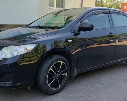 Черный Тойота Королла, объемом двигателя 1.6 л и пробегом 240 тыс. км за 7000 $, фото 1 на Automoto.ua