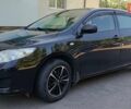 Черный Тойота Королла, объемом двигателя 1.6 л и пробегом 240 тыс. км за 7000 $, фото 1 на Automoto.ua