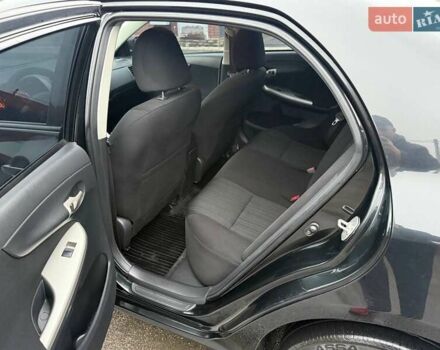 Черный Тойота Королла, объемом двигателя 1.59 л и пробегом 192 тыс. км за 9250 $, фото 19 на Automoto.ua