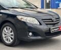Черный Тойота Королла, объемом двигателя 1.6 л и пробегом 186 тыс. км за 7990 $, фото 3 на Automoto.ua