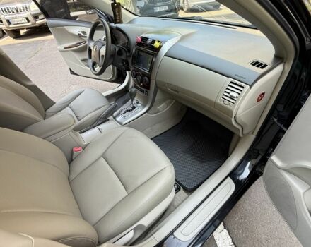 Чорний Тойота Королла, об'ємом двигуна 1.8 л та пробігом 191 тис. км за 7599 $, фото 16 на Automoto.ua