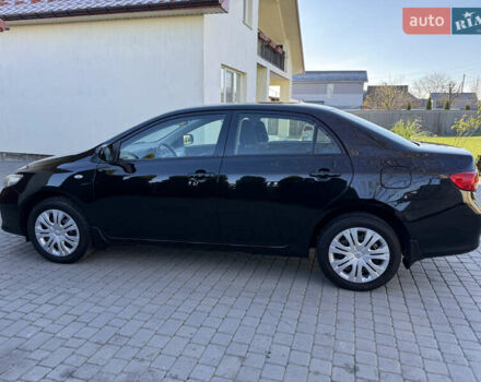 Черный Тойота Королла, объемом двигателя 1.6 л и пробегом 147 тыс. км за 6999 $, фото 5 на Automoto.ua