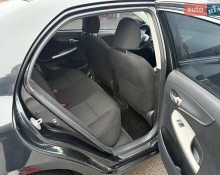 Черный Тойота Королла, объемом двигателя 1.59 л и пробегом 192 тыс. км за 9250 $, фото 24 на Automoto.ua