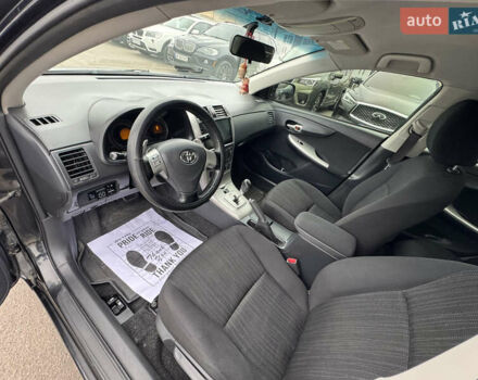 Черный Тойота Королла, объемом двигателя 1.6 л и пробегом 221 тыс. км за 6999 $, фото 10 на Automoto.ua