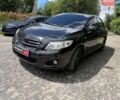 Черный Тойота Королла, объемом двигателя 1.6 л и пробегом 238 тыс. км за 7190 $, фото 1 на Automoto.ua