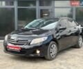 Чорний Тойота Королла, об'ємом двигуна 1.6 л та пробігом 235 тис. км за 5500 $, фото 1 на Automoto.ua