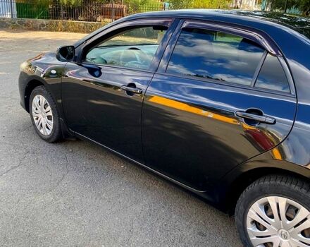 Черный Тойота Королла, объемом двигателя 1.6 л и пробегом 207 тыс. км за 7500 $, фото 1 на Automoto.ua