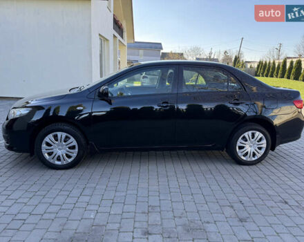 Черный Тойота Королла, объемом двигателя 1.6 л и пробегом 147 тыс. км за 6999 $, фото 4 на Automoto.ua