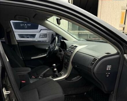 Черный Тойота Королла, объемом двигателя 1.6 л и пробегом 180 тыс. км за 5999 $, фото 20 на Automoto.ua