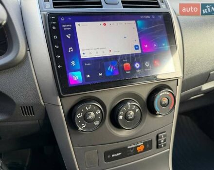 Черный Тойота Королла, объемом двигателя 1.6 л и пробегом 186 тыс. км за 7990 $, фото 17 на Automoto.ua