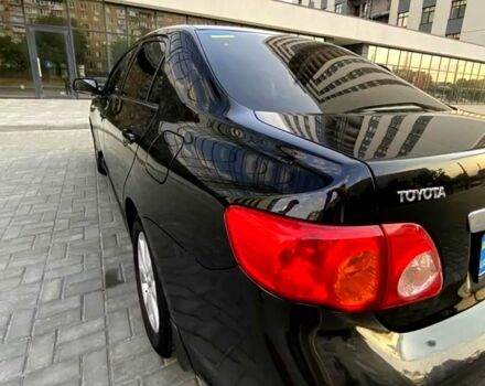 Черный Тойота Королла, объемом двигателя 1.8 л и пробегом 240 тыс. км за 7599 $, фото 2 на Automoto.ua