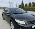 Чорний Тойота Королла, об'ємом двигуна 1.6 л та пробігом 267 тис. км за 7399 $, фото 1 на Automoto.ua