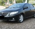 Чорний Тойота Королла, об'ємом двигуна 1.6 л та пробігом 170 тис. км за 8200 $, фото 1 на Automoto.ua