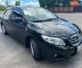 Чорний Тойота Королла, об'ємом двигуна 1.6 л та пробігом 240 тис. км за 6800 $, фото 1 на Automoto.ua