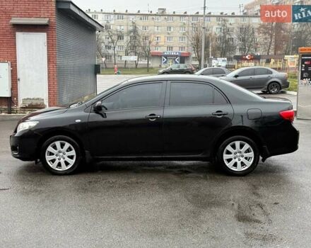 Черный Тойота Королла, объемом двигателя 1.59 л и пробегом 192 тыс. км за 9250 $, фото 4 на Automoto.ua