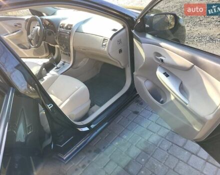 Чорний Тойота Королла, об'ємом двигуна 1.6 л та пробігом 195 тис. км за 8500 $, фото 9 на Automoto.ua