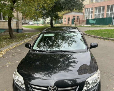 Чорний Тойота Королла, об'ємом двигуна 1.6 л та пробігом 147 тис. км за 7700 $, фото 6 на Automoto.ua