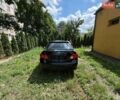 Чорний Тойота Королла, об'ємом двигуна 1.6 л та пробігом 235 тис. км за 1950 $, фото 1 на Automoto.ua