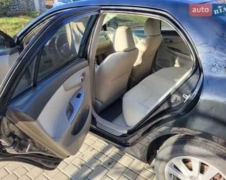 Чорний Тойота Королла, об'ємом двигуна 1.6 л та пробігом 195 тис. км за 8500 $, фото 12 на Automoto.ua