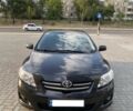 Черный Тойота Королла, объемом двигателя 1.8 л и пробегом 240 тыс. км за 7999 $, фото 1 на Automoto.ua