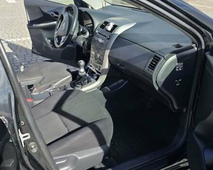 Черный Тойота Королла, объемом двигателя 1.6 л и пробегом 244 тыс. км за 6950 $, фото 17 на Automoto.ua