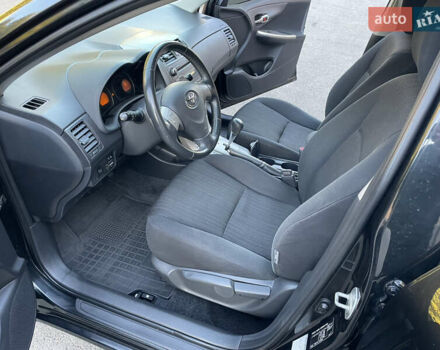Чорний Тойота Королла, об'ємом двигуна 1.6 л та пробігом 174 тис. км за 7400 $, фото 9 на Automoto.ua