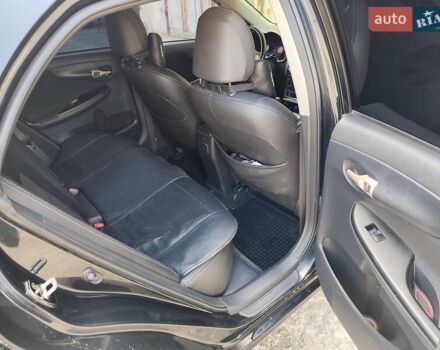 Черный Тойота Королла, объемом двигателя 1.6 л и пробегом 290 тыс. км за 7500 $, фото 10 на Automoto.ua