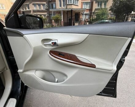 Чорний Тойота Королла, об'ємом двигуна 1.8 л та пробігом 191 тис. км за 7599 $, фото 21 на Automoto.ua