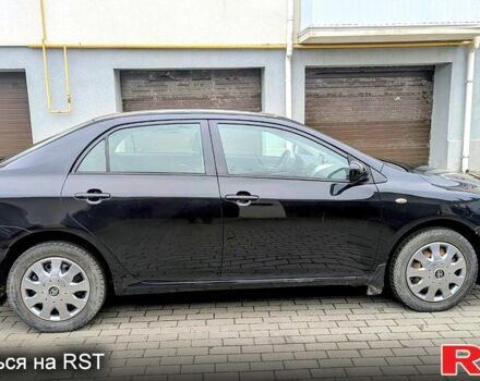 Чорний Тойота Королла, об'ємом двигуна 1.6 л та пробігом 197 тис. км за 6000 $, фото 6 на Automoto.ua
