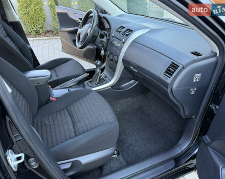 Черный Тойота Королла, объемом двигателя 1.6 л и пробегом 147 тыс. км за 6999 $, фото 48 на Automoto.ua