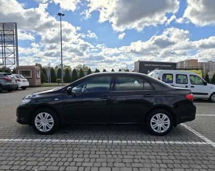 Черный Тойота Королла, объемом двигателя 1.6 л и пробегом 244 тыс. км за 6950 $, фото 2 на Automoto.ua