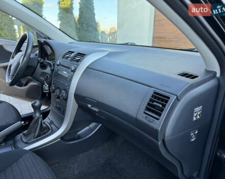 Черный Тойота Королла, объемом двигателя 1.6 л и пробегом 147 тыс. км за 6999 $, фото 51 на Automoto.ua