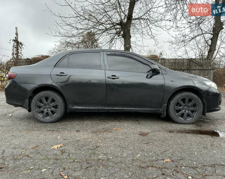 Черный Тойота Королла, объемом двигателя 1.33 л и пробегом 251 тыс. км за 5500 $, фото 3 на Automoto.ua