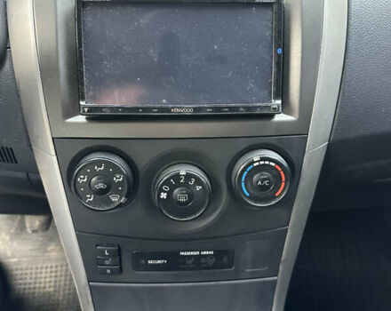 Черный Тойота Королла, объемом двигателя 1.33 л и пробегом 251 тыс. км за 5500 $, фото 18 на Automoto.ua