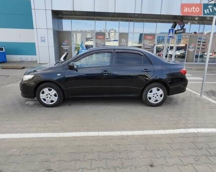 Чорний Тойота Королла, об'ємом двигуна 1.4 л та пробігом 229 тис. км за 6999 $, фото 9 на Automoto.ua