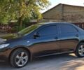 Чорний Тойота Королла, об'ємом двигуна 1.6 л та пробігом 117 тис. км за 7800 $, фото 1 на Automoto.ua