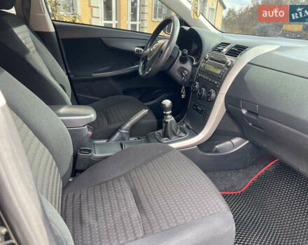 Черный Тойота Королла, объемом двигателя 1.33 л и пробегом 237 тыс. км за 5450 $, фото 13 на Automoto.ua