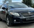 Чорний Тойота Королла, об'ємом двигуна 1.6 л та пробігом 117 тис. км за 7840 $, фото 1 на Automoto.ua