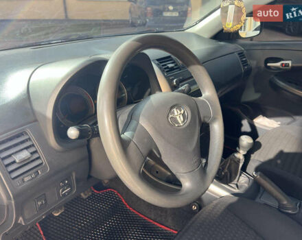 Черный Тойота Королла, объемом двигателя 1.33 л и пробегом 237 тыс. км за 5450 $, фото 16 на Automoto.ua